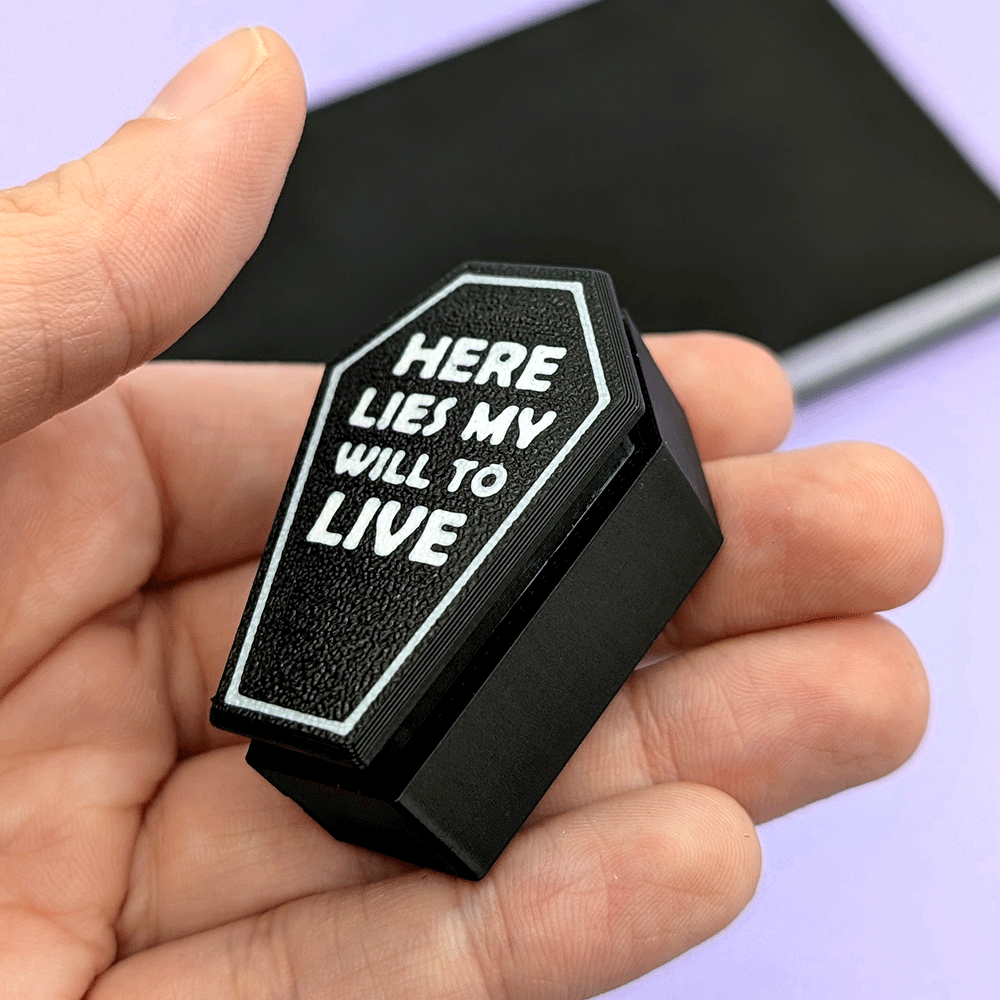 Will To Live Coffin Clicky Keychain