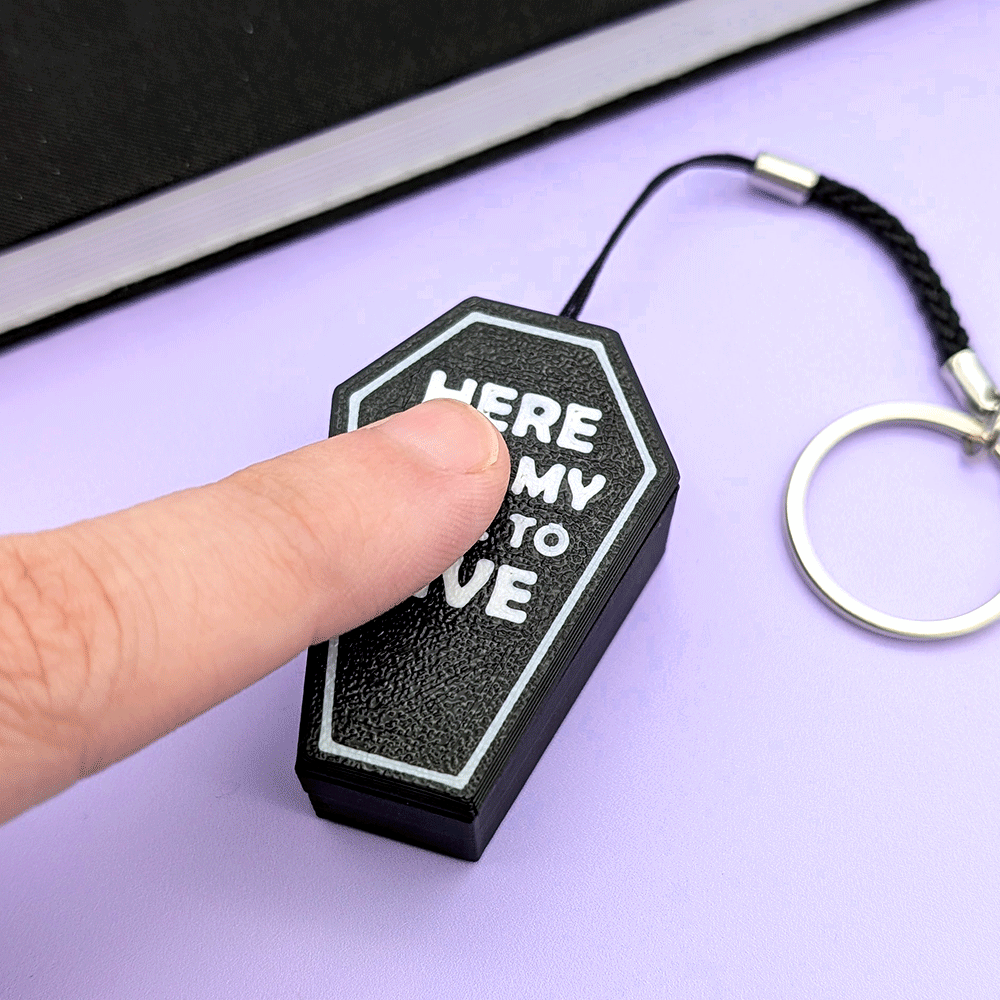 Will To Live Coffin Clicky Keychain