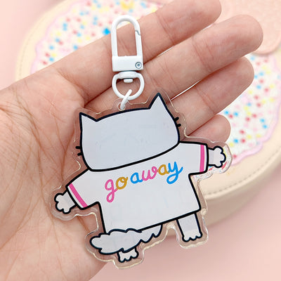 The back of our keychain gets straight to the point reading Go Away, perfect for attaching onto your favourite bags!